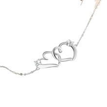 Load image into Gallery viewer, Bracelets Sterling Silver Intertwined Heart Bracelet with Cubic Zirconia
